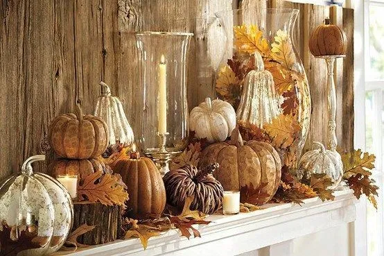 ** Absolutely LOVE this mix of wooden, mercury glass and twine pumpkins with leaves!