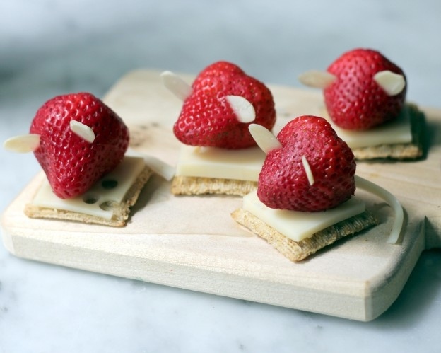 All a strawberry needs to be a mouse is a string cheese tail and almond ears.