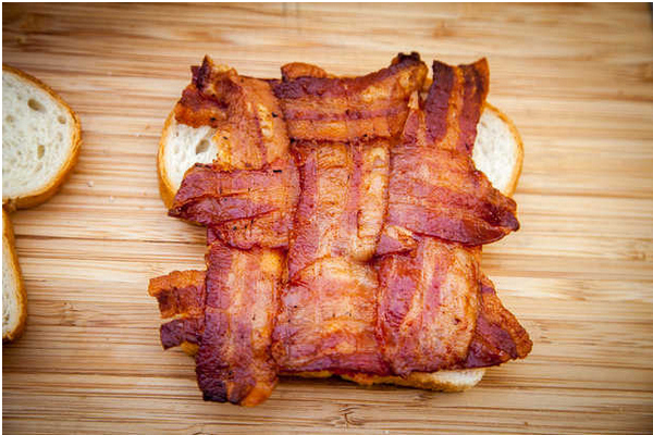 This glorious culinary creation allows for maximum bacon consumption in every bite.