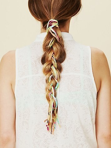 For a bohemian look, try incorporating braid ins — and mix them up!