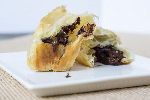 Puff pastry + candy you have lying around = chocolate croissants the laziest girl on Earth could make.