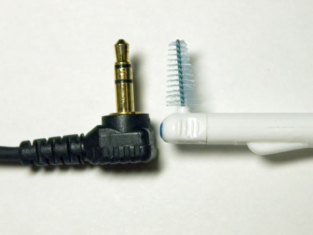 An interdental brush is perfectly-sized for cleaning the headphone jack on any device.