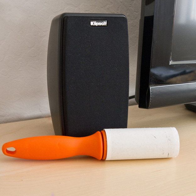 A lint-roller lifts dust right off of speaker grill fabric.