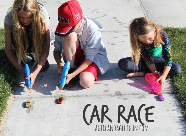 Get up a sidewalk racetrack and propel toy cars with squirt guns.