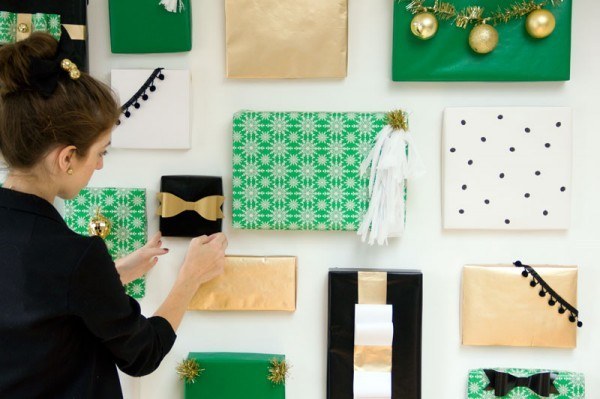 Make a backdrop of gift boxes for pictures.