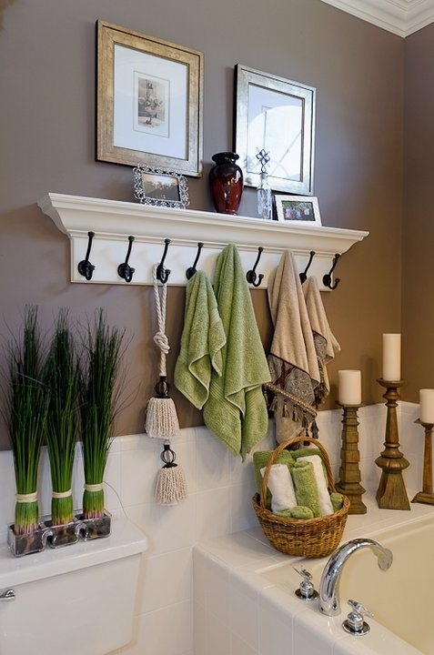 3. Use coat hooks instead of a towel rod for shared bathrooms.