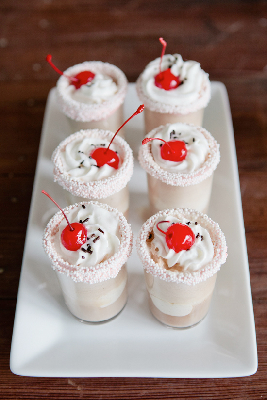 Is a tray of many ice cream floats.